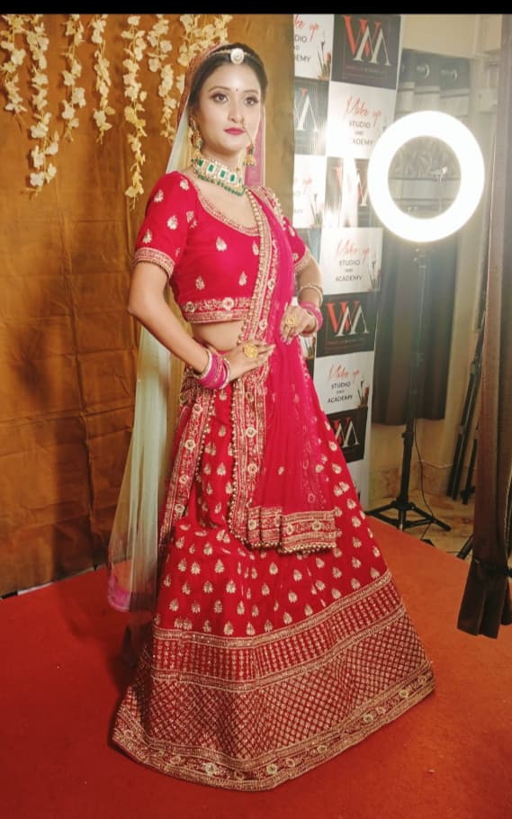 Red saree from Rongsuto